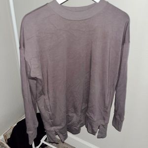 Purple sweater. Fuzzy inside. HAS POCKETS